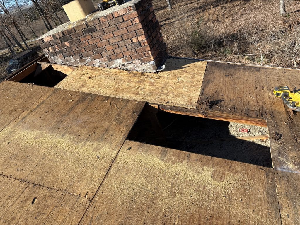 Care is taken to ensure that any bad sheets of plywood or OSB are still in good enough condition for a new roof.