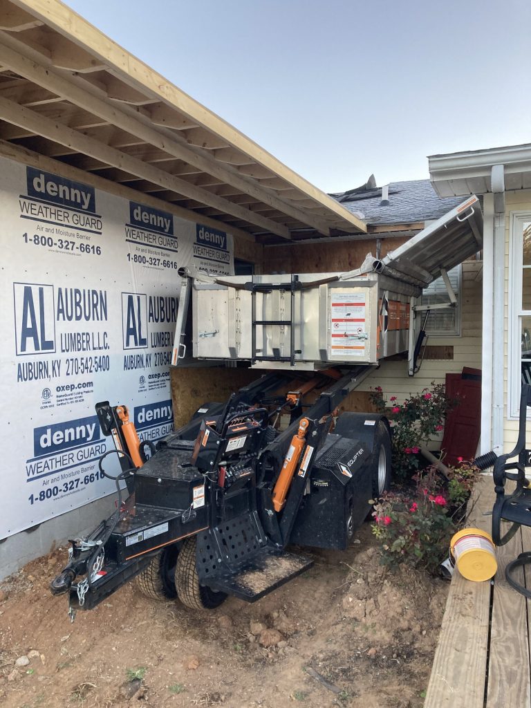 Specialized equipment used to keep flower beds and yards from getting destroyed when replacing a roof